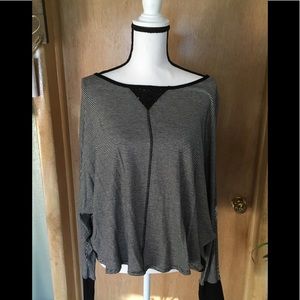 XL black and white striped shirt.